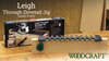Leigh Through Dovetail Jig Model TD330 with box and wooden test piece on workbench