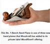 Hand holding a No. 1 WoodRiver bench hand plane with wooden handles and metal body.