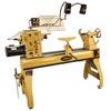 Powermatic wood lathe with tool rest, tailstock, and dual adjustable work lights in workshop setting